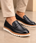 MOCASSIM GRIFFO RAVENNA™ — Elegância por cima. Segurança em cada passo.